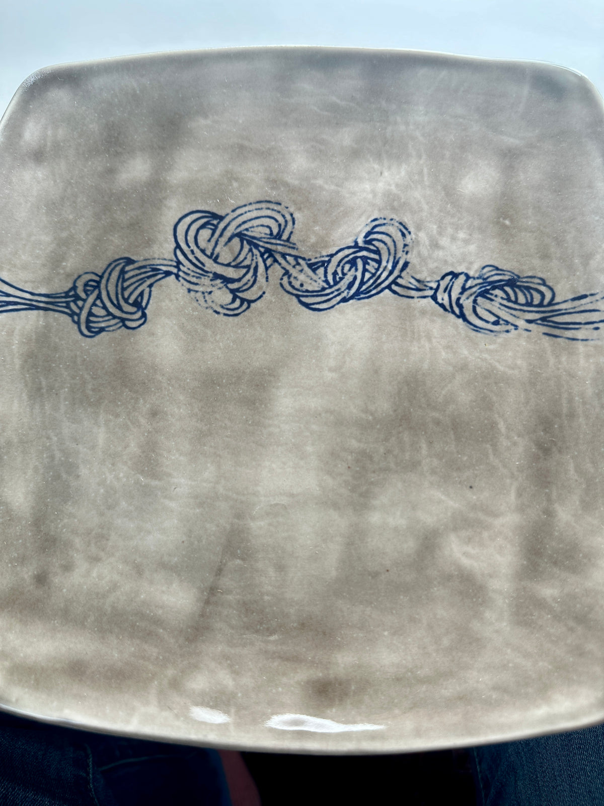 Grey square knot plate