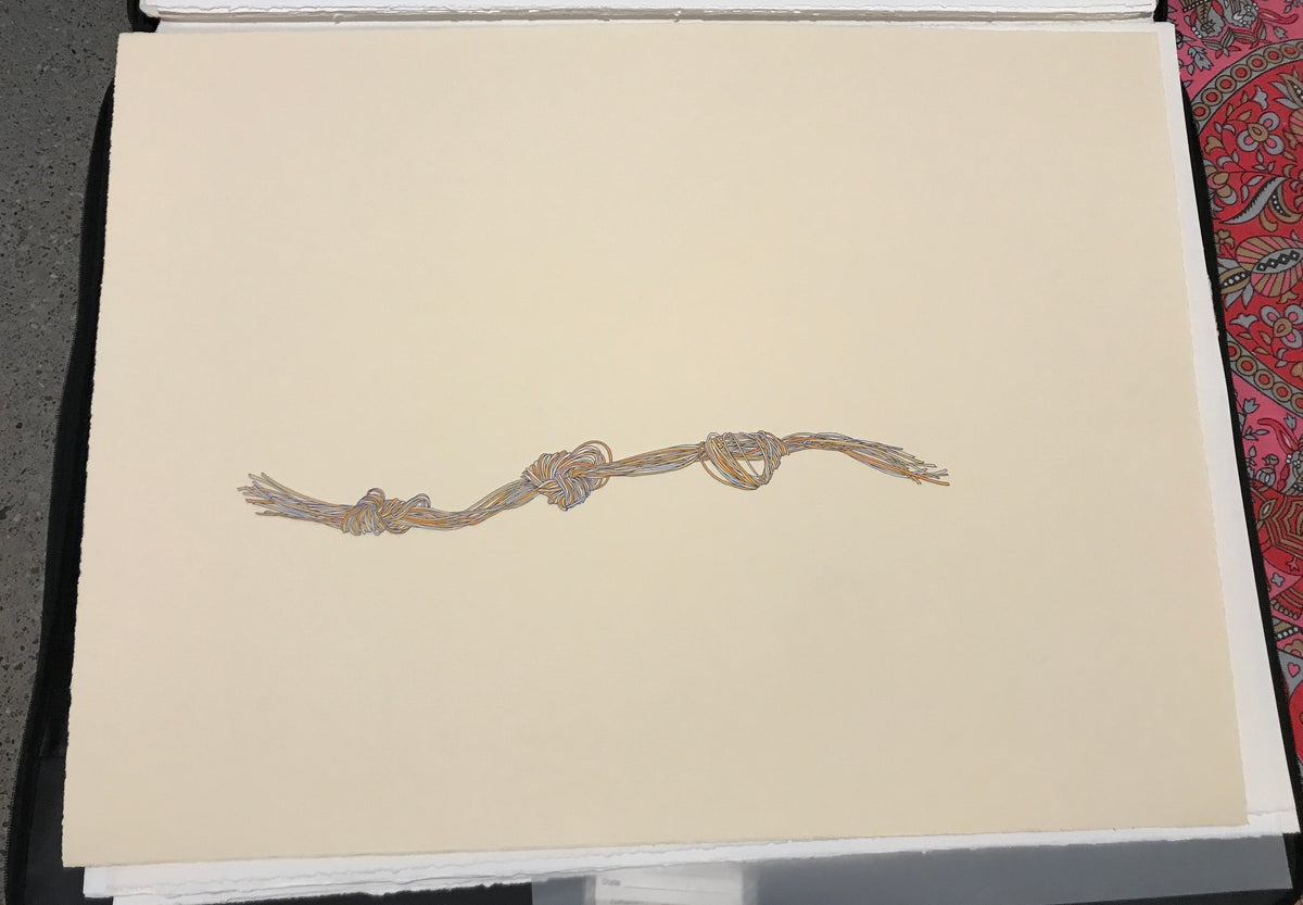 SOLD . Orange Knot