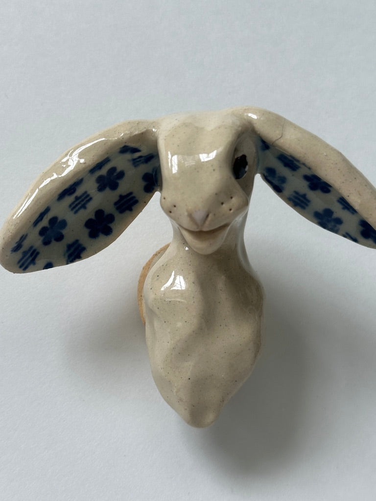 Rabbit with turquoise flower ears