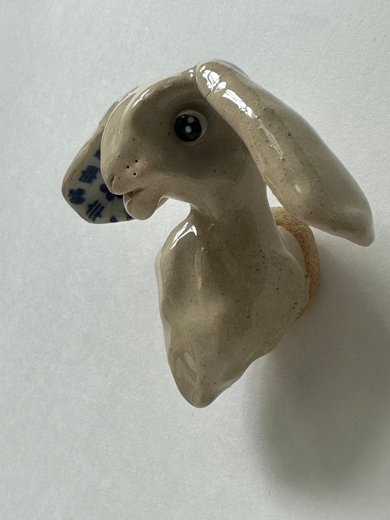 Rabbit with turquoise flower ears