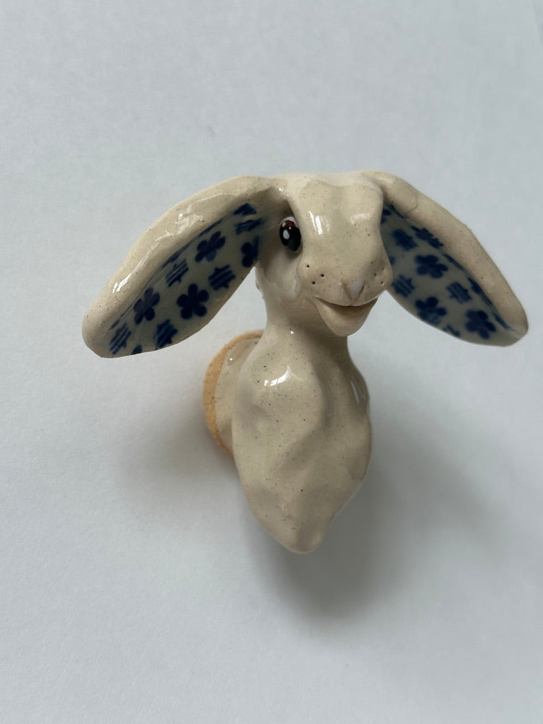 Rabbit with turquoise flower ears