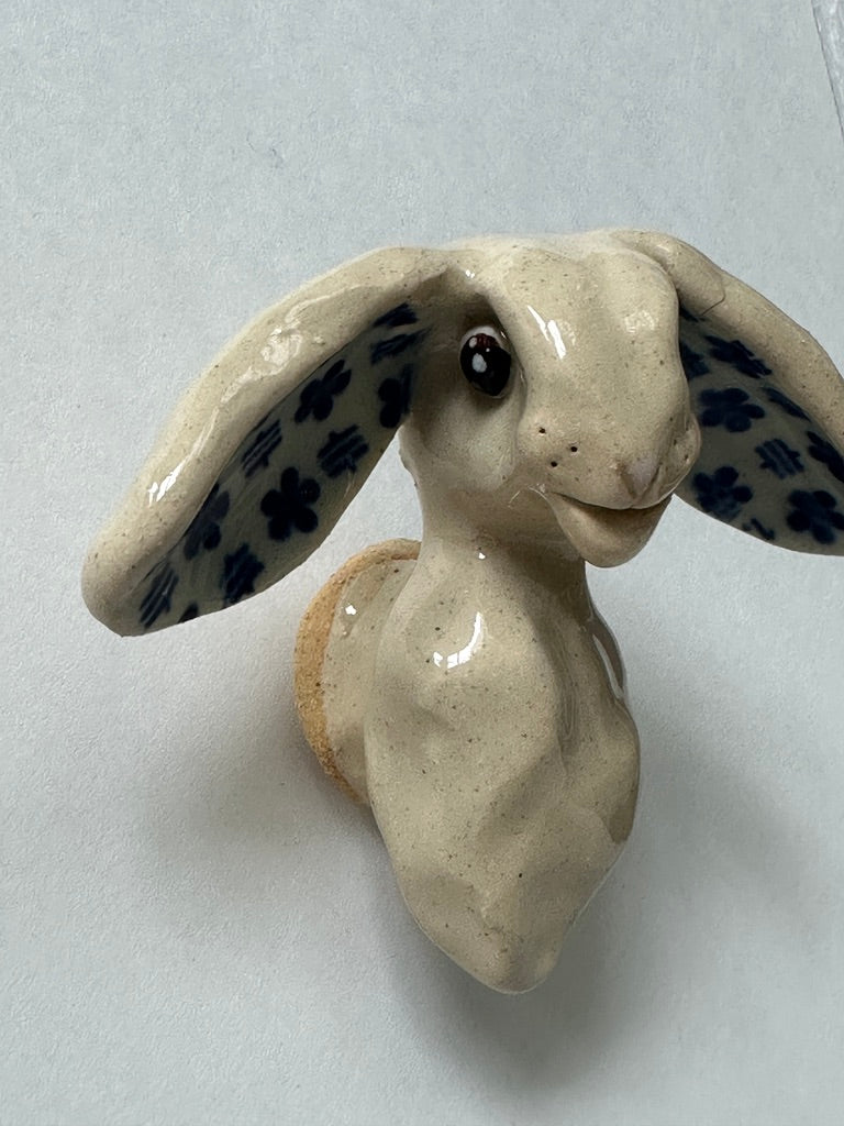Rabbit with turquoise flower ears
