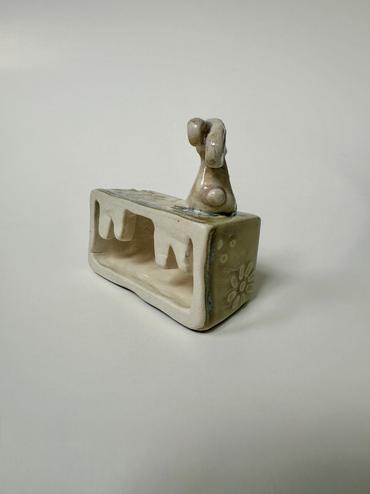 Rabbit on a flowery box - wall hanging