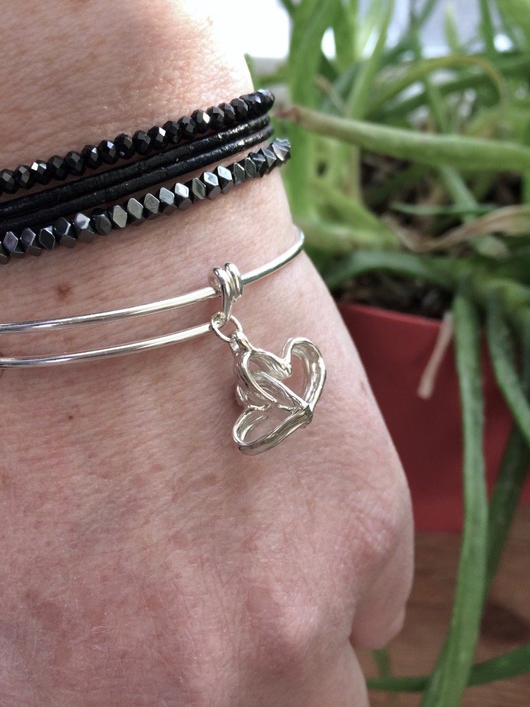 Intertwined Hearts - adjustable bracelet - Amanda Schoppel Art & Wax Carving