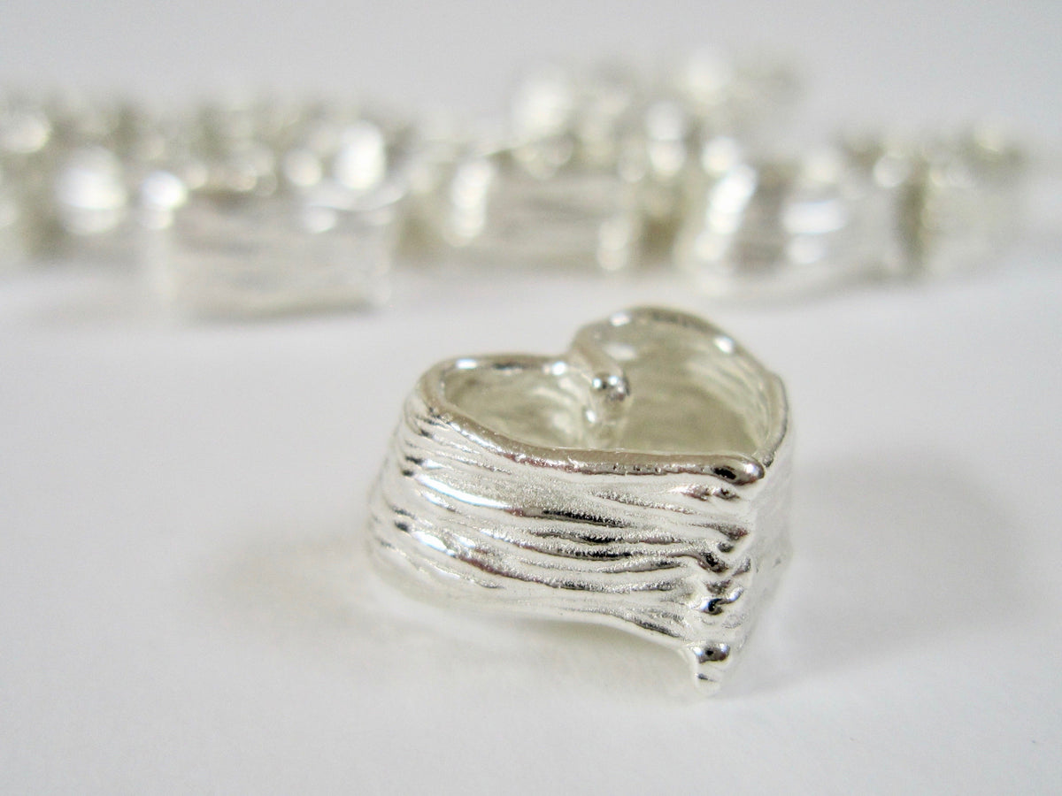 Intertwined Hearts - adjustable bracelet - Amanda Schoppel Art & Wax Carving